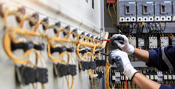 Professional Electrician technician working in Vails Gate, NY